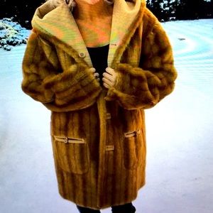 Reversible fur jacket with hood